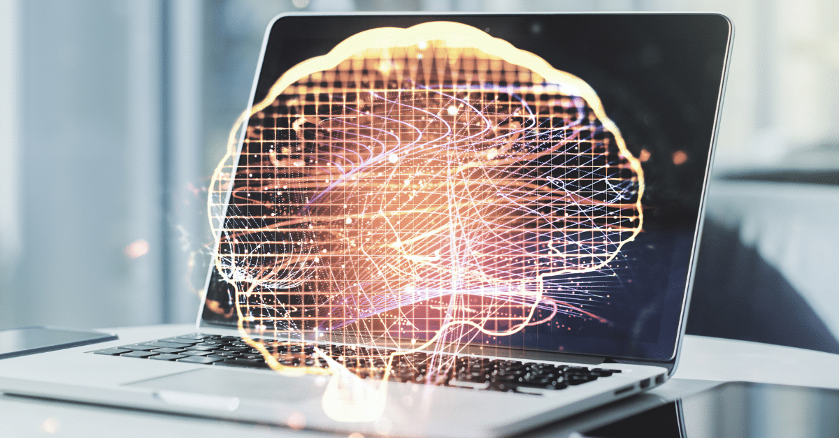 laptop with brain image on screen to depict Noetic's machine learning capabilities